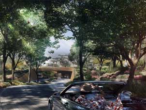 The welcoming entrance to Ghaf Woods, surrounded by lush greenery and mature trees.