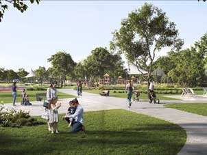Community park within Ora Bayn, featuring green spaces, pathways, and recreational areas for residents.