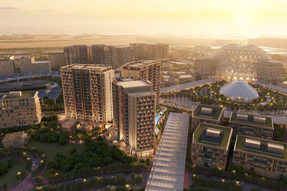 Aerial view of Ghaf Woods community with modern buildings surrounded by lush greenery