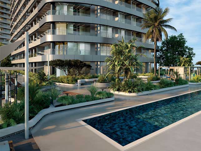 Lap pool at Skyhill Astra, a residential development in Dubai, featuring ample swimming length and a serene environment.