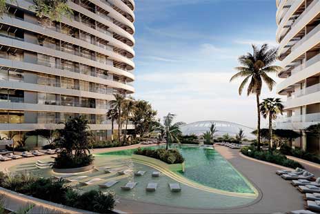 Luxury pool view at SkyHills Astra in Dubai Science Park with modern towers and palm trees.