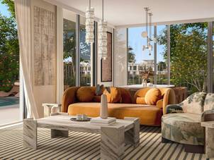Modern interior design of a living space at Riviera, The Valley, showcasing contemporary furniture, lighting, and a connection to the outdoor environment.