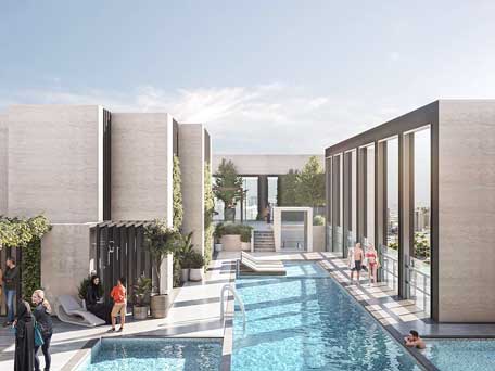 Rooftop pool at Urban Park Residences with modern design, lounge areas, and stunning city views